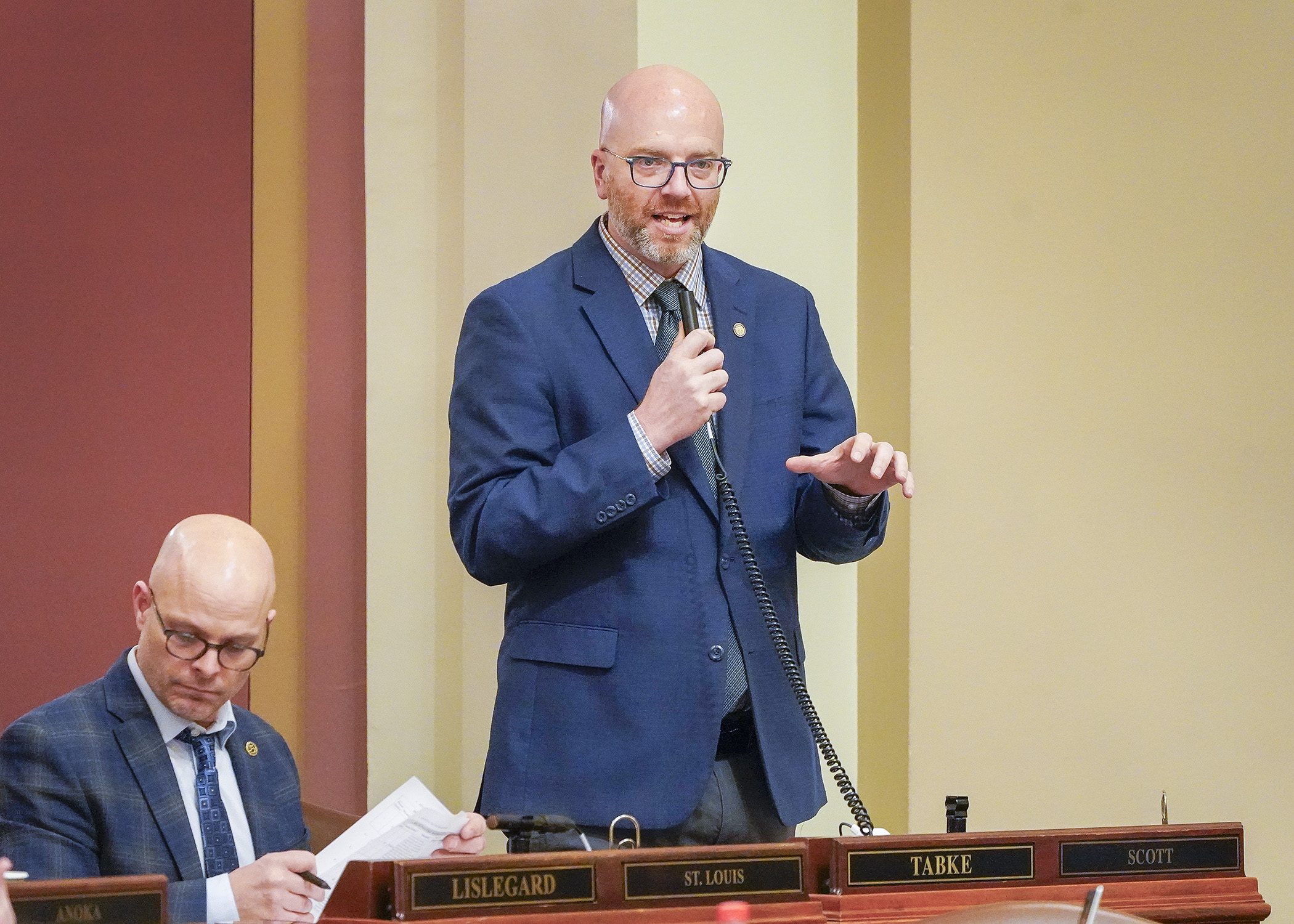 Rep. Brad Tabke presents the transportation policy bill on the House Floor April 4. (Photo by Andrew VonBank)